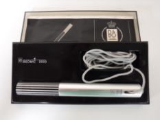 A boxed Bang & Olufsen Beomic 2000