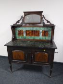 A late Victorian marble topped washstand with tiled back and mirror