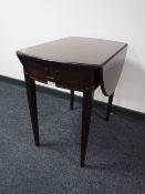 An inlaid mahogany strongbow flap sided table fitted a drawer