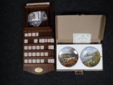 A set of twelve boxed Bradford exchange calendar plates, months of the year,