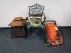 A cast iron garden seat, a metal brazier,