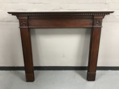 A mahogany fire surround