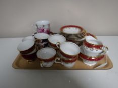 A tray containing a twenty piece Aynsley gilded part tea service,