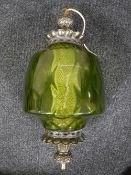 A green glass light fitting