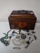 A Victorian mahogany sarcophagus tea caddy containing sterling silver jewellery,