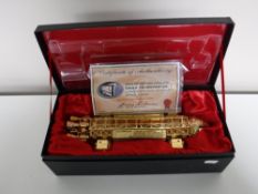 A boxed Gerry Anderson 22ct gold plated Eagle Transporter with certificate