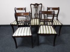 Four inlaid mahogany dining chairs and a carver armchair