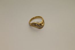 An 18ct gold eight stone diamond ring, 5.