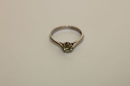 An 18ct white gold solitaire diamond ring