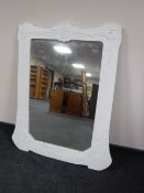 A white painted framed mirror
