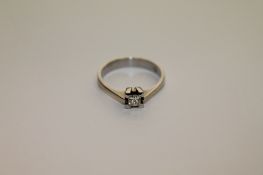 An 18ct white gold princess cut diamond ring