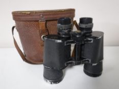 A pair of leather cased Hulda 7x50 binoculars