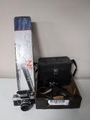 A box containing five cameras, including a Praktica Super TL1000,