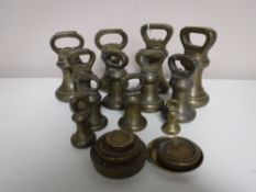A collection of 19th century brass weights