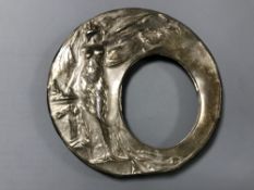 A circular sterling silver art nouveau photo frame