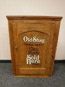 A Victorian and later pine corner cabinet 'Old Shag Tobbaco',