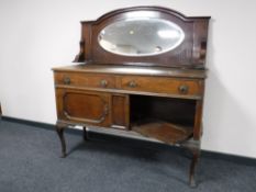 An oak Queen Anne style mirror back sideboard