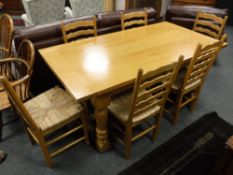 A good quality light oak farmhouse style refectory dining table, length 180 cm,