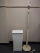 A painted standard lamp,