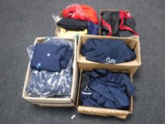 Five boxes containing sportswear including sweaters, tracksuit pants,
