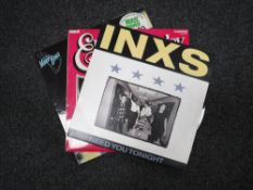 Two pallets containing seven boxes of vinyl LP records, one box of vinyl 45 singles,