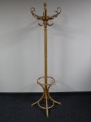 A contemporary bentwood hat and coat stand