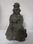 A bronze figure of a Eastern deity