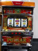 A Yamasa King Pulsar fruit machine with tokens and keys