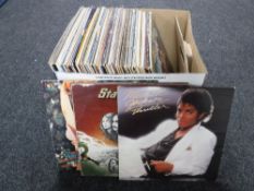 A box containing LP's including easy listening, Michael Jackson,