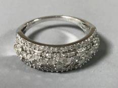 A diamond half eternity ring, approximately 1ct, colour G-H, Clarity I1 I2, size N,
