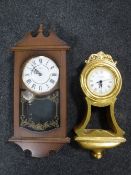 Two contemporary quartz wall clocks