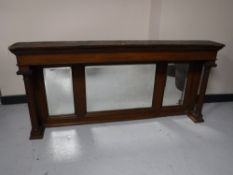 An early 20th century oak mirrored sideboard back