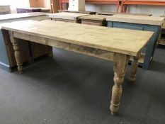 A pine farmhouse kitchen table