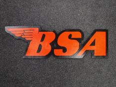 A hand painted BSA motorcycles advertisement on board