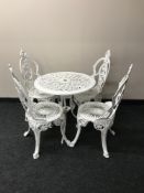 A circular cast metal patio table,