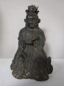 A bronze figure of a Eastern deity
