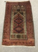 An old Beluchi rug 140 cm x 89 cm