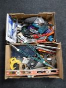 Two boxes of assorted hand tools, power tools,