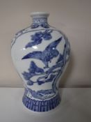 A Chinese blue and white vase with bird decoration,