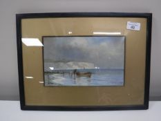 Twentieth Century School : A fishing boat and fisherman in calm waters with white cliffs beyond,