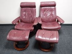 A pair of Burgundy leather Stressless Ekornes armchairs with stools