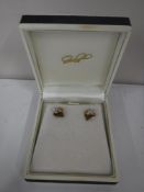 A pair of 9ct gold diamond set heart earrings