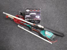A Bosch electric hedge trimmer,