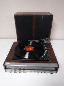 An Ultra stereo turntable with speakers
