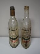 Two vintage Grant's Whisky bottles