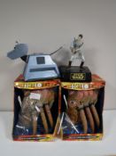 Two boxed Doctor Who voice changing masks together with a Doctor Who K-9 and a Star Wars Obi Wan