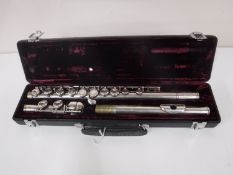 A Buffet Crampon Paris flute, numbered 228, in fitted case.