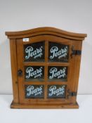 A pine glazed door wall cabinet - Pears Soap CONDITION REPORT: This measures 59cm