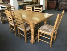 A good quality light oak farmhouse style refectory dining table, length 180 cm,