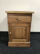 A reclaimed pine cupboard fitted a drawer